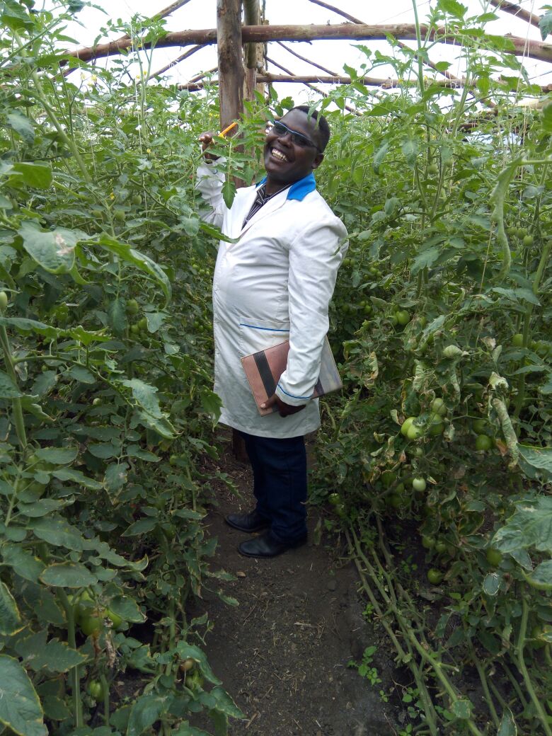 Geoffrey Rono in his greenhouse farm near Mara River Narok