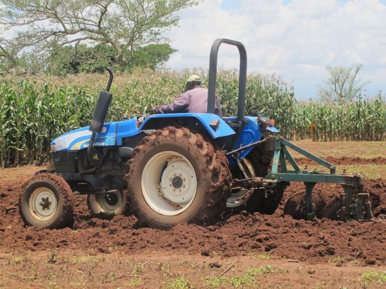 tractor tilling a land