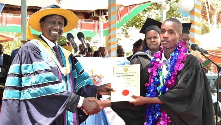 DP Ruto hands over cert to grad